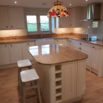 White kitchen with wooden worktops