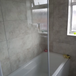 Bath with shower built in