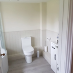 Bathroom with white toilet